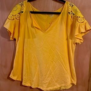 NY&Co soho bright yellow top with lace details on the shoulders